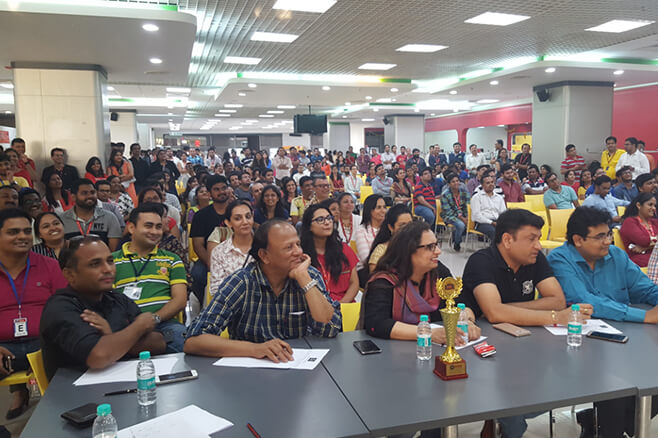 Judges at a Talent Show for Employees